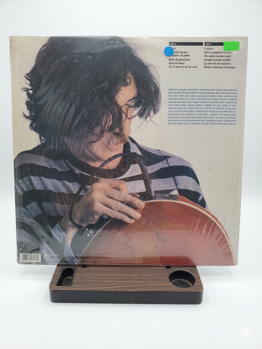 Charly García –  Filosofía barata y zapatos de goma